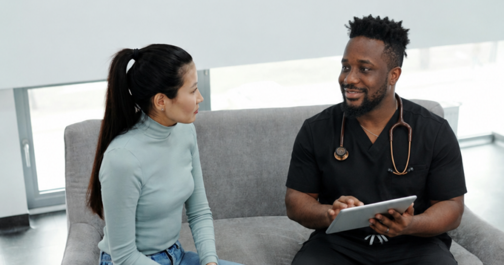 Direct Primary Care physician talking with an adult patient during a primary care visit in Las Vegas